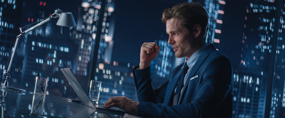 Poster - Successful Handsome Businessman Working on Laptop Computer in Big City Office Late in the Evening. Finance Investment Analyst Checking Financial Data from Project Management Report.