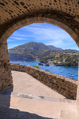 Wall Mural - Glimpse of Ischia Island in Italy from Aragonese Castle: Cartaromana beach in the distance.