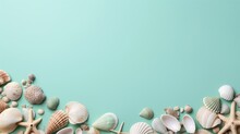 Shells And Stones On A Mint Background.