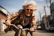Crazy granny riding BMX on the street. 