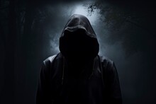 Hooded Man On Dark Background