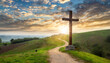 wooden cross of jesus christ faith religion standing on a hill during sunrise cloudy sky with a path road