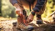 A man tying his hiking boots on a trail, AI