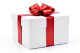 Fototapeta  - White gift box with red bow on white background - Clipping path included.