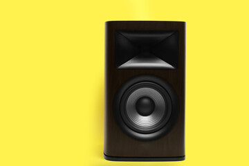 Wall Mural - One wooden sound speaker on yellow background. Space for text