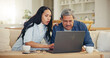 © Azeemud/peopleimages.com - Woman, senior dad and laptop with teaching, reading and typing for email notification, web or search. Computer, elderly father and daughter with click, learning and family home lounge on social media
