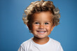 portrait of a smiling boy with healthy teeth