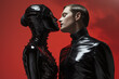 BDSM couple, fetish, erotic games. A man kissing a woman in a latex suit