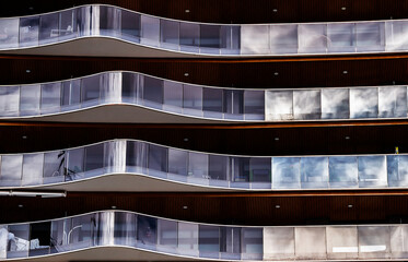 Wall Mural - reflections in the glass of the balconies