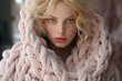 Beauty, fashion, make-up and lifestyle concept. Beautiful blonde woman wearing fluffy pink sweater and looking at camera with seductive look