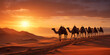 Sequence of camels lined up across a desert landscape