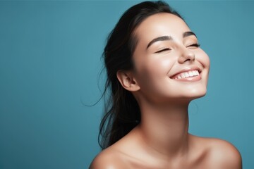 Wall Mural - smiling woman enjoying beauty treatment on blue background. AI Generated