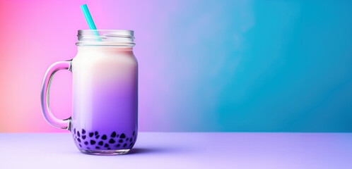 Wall Mural - A glass of bubble milk with a blue straw