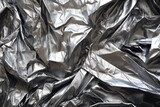 Fototapeta Przestrzenne - macro of silver foil crumples and creases