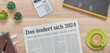 Zeitung mit der Headline Das ändert sich 2024