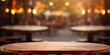 Nightlife elegance. Blurred bar ambiance. Retro vibes. Wooden table in vintage. Cozy evening. Abstract background of cafe. Urban lifestyle. Counter in bokeh harmony