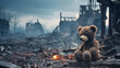 Teddy bear at the destroyed building. War concept