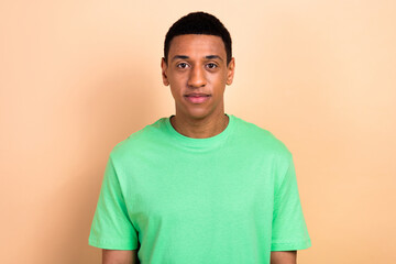 Sticker - Photo portrait of attractive young man calm face look camera dressed stylish green clothes isolated on beige color background