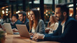 © Synthetica - Group of business people working together in a cafe. Business concept.