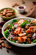 Salmon superfood salad with grilled fish, kale, quinoa, pecan nuts, red onion and pomegranate
