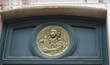 For Saint Mark, the patron saint of Venice, Italy, the traditional symbol is a winged lion. The lion in this doorway transom holds the inscription, Peace Unto You, Mark, My Evangelist.