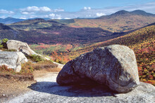 Huge Boulder And Spectacular View Of Mountains And National Forest From Granite Ledge Atop Summit Of Middle Sugarloaf Mountain In The White Mountains Of New Hampshire.