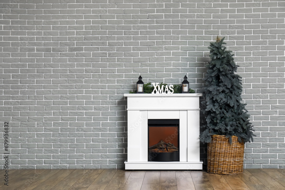 Interior of living room with fireplace and Christmas tree
