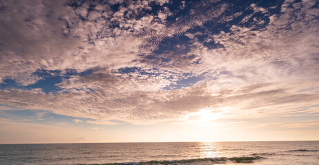 Wall Mural - Beautiful clouds blue sky with the sea in summer season landscape nature view background