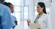 © Charlize D/peopleimages.com - Healthcare, team and documents for discussion in hospital with collaboration, meeting and patient report. Medical, doctor and nurse in clinic with paperwork, teamwork and communication for planning