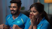 Emotional Girl Crying After Victory While Watching Cricket Match With Brother At Home On Television - Concept Of Emotional Sports Fans, Tears Of Joy And Entertainment.