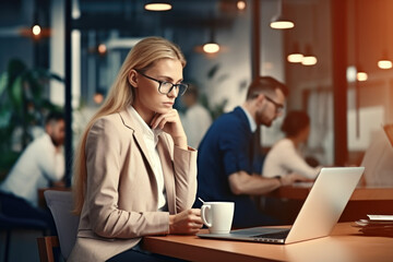 Young business woman with laptop thinking, planning and reading online news report, project feedback or research ideas. Wonder, problem solving and professional female designer with doubt over design