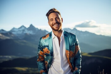 Poster - Portrait of a cheerful man in his 30s wearing a trendy bomber jacket against a backdrop of mountain peaks. AI Generation