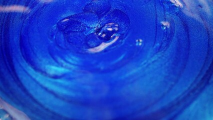 Wall Mural - falling drops of blue paint, abstract image