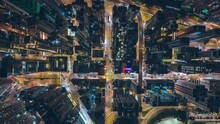Top View Hyperlapse Of Traffic In Hong Kong City, Aerial View City Streets At Night, Establishing Shot For Innovation Technology And Transportation Concept