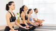 © JR-50 - Mindful Meditation: Group Finds Serenity in Yoga Practice