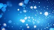 © Adam - Bokeh lights on blue background. Abstract blue bokeh background with glittering lights.