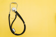 © Светлана Назарова - Stethoscope on yellow background and space for text, medical equipment for banner