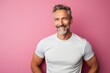 © CogniLens - Portrait of a satisfied man in his 40s sporting a breathable mesh jersey against a solid pastel color wall. AI Generation