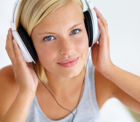 Canvas Print - Portrait, smile and woman with headphones, streaming music and listening to audio with radio, apartment and sound. Face, home and person with a headset, podcast and wellness with peace and hearing