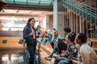 © Marko Geber - Diverse Group of Students Engaged in a Lecture