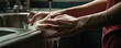 Housewife washes hands or dishes detail. Cleaning Hands. hygiene concept.
