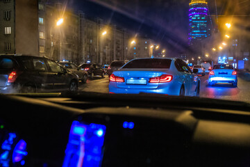 Wall Mural - Night traffic on the avenue in the city