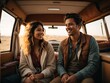 © John Vogia - Snapshot of a man and woman relishing the freedom and adventure of van life, embodying the spirit of nomadic living in their recreational vehicle.