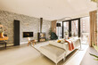 © ADDICTIVE STOCK - Living room with couch and fireplace by window