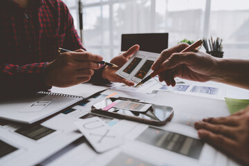 Creative business team in mobile software design project, brainstorming meeting, working together, internet technology in smartphone web part, teamwork concept, colleagues.