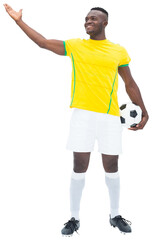 Canvas Print - Digital png photo of african american male soccer player with ball on transparent background