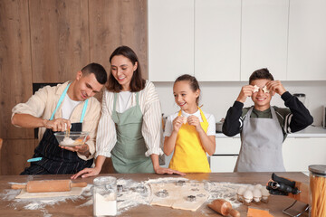 Canvas Print - Happy family making cookies in kitchen