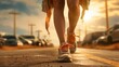 Closeup of a girl walking on the road in a sneakers