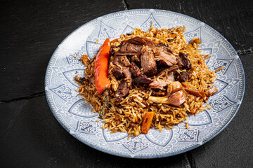 Sticker - Pilaf with meat and vegetables in a bowl