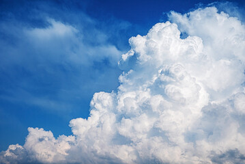 Wall Mural - Blue sky background with tiny clouds.